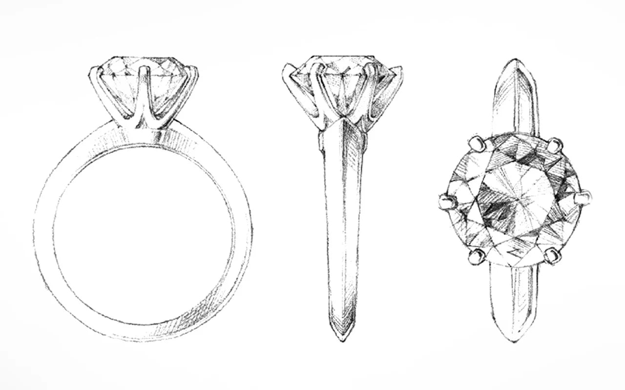 Skizze eines klassischen Verlobungsrings mit rundem Brillantschliff-Diamanten in einer eleganten Krappenfassung. Detaillierte Designzeichnungen zeigen Seiten- und Draufsicht, ideal für Schmuckliebhaber und zukünftige Brautpaare, die hochwertigen Stil und Präzision suchen.